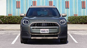 MINI Countryman front view MINI Countryman in parking spot front view